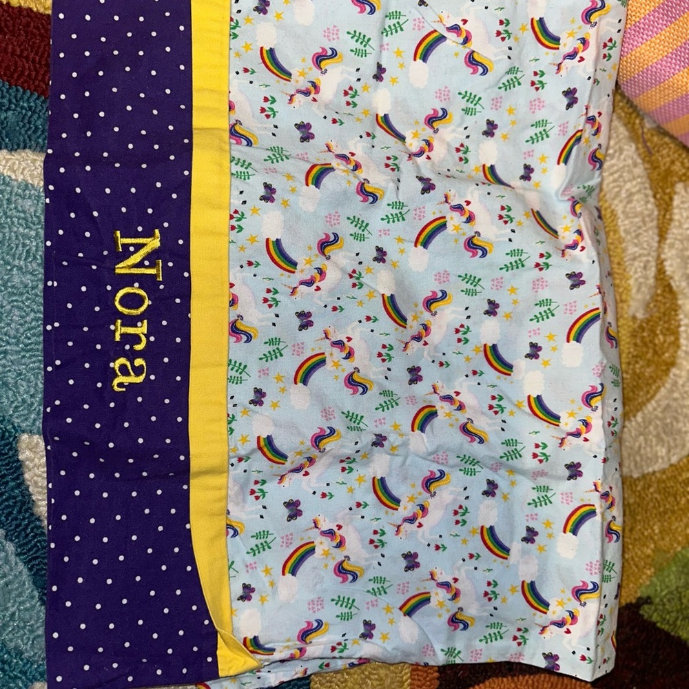 NOR Purple and Yellow Space-Themed Pillow